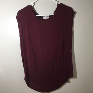 Maroon colored T-shirt. Lightly used.